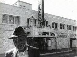 Nick Stewart standing in front of the Ebony Showcase Theater